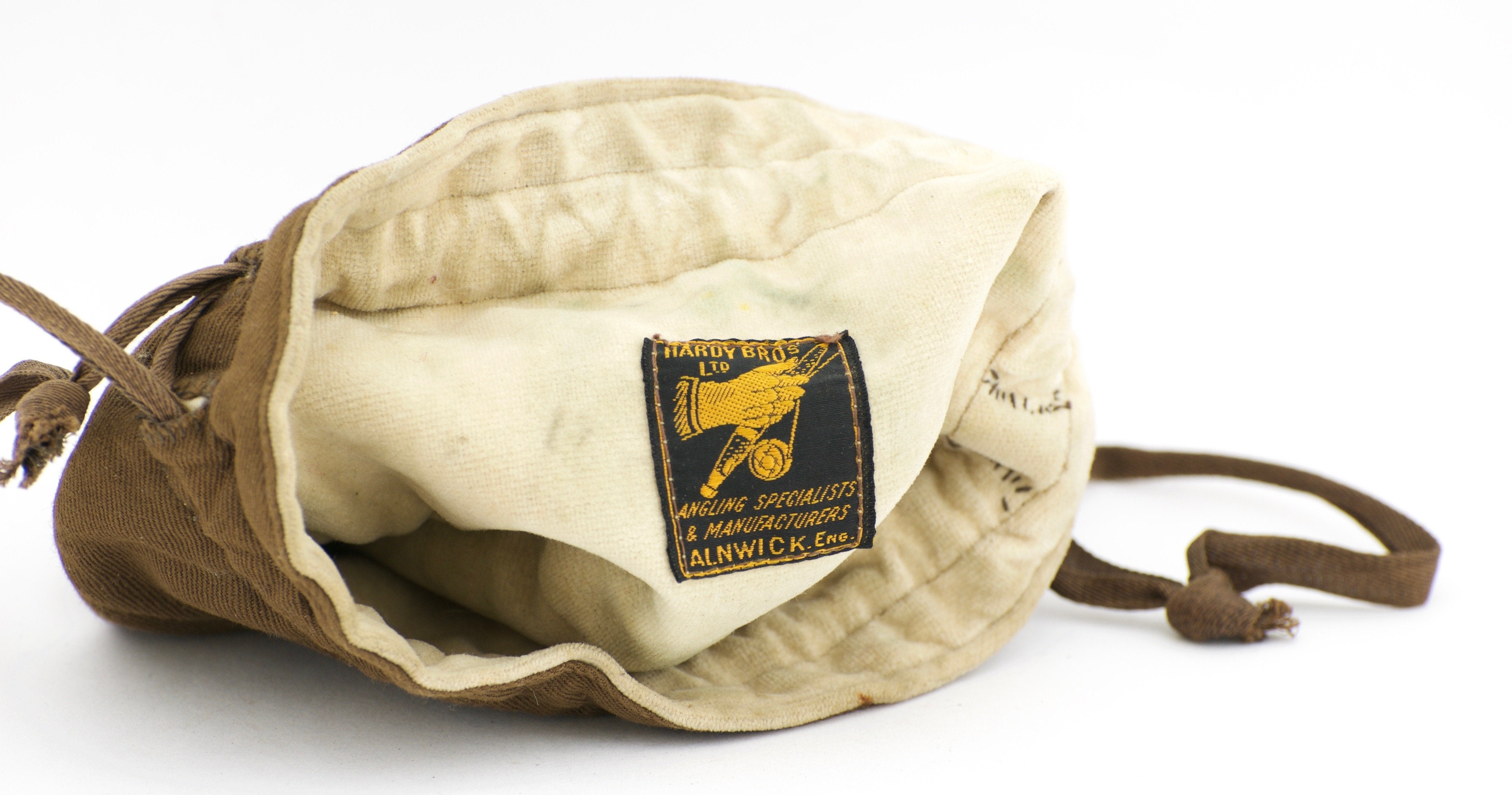 An early Hardy Brothers Selvyt fishing reel pouch with, 17th June 2021